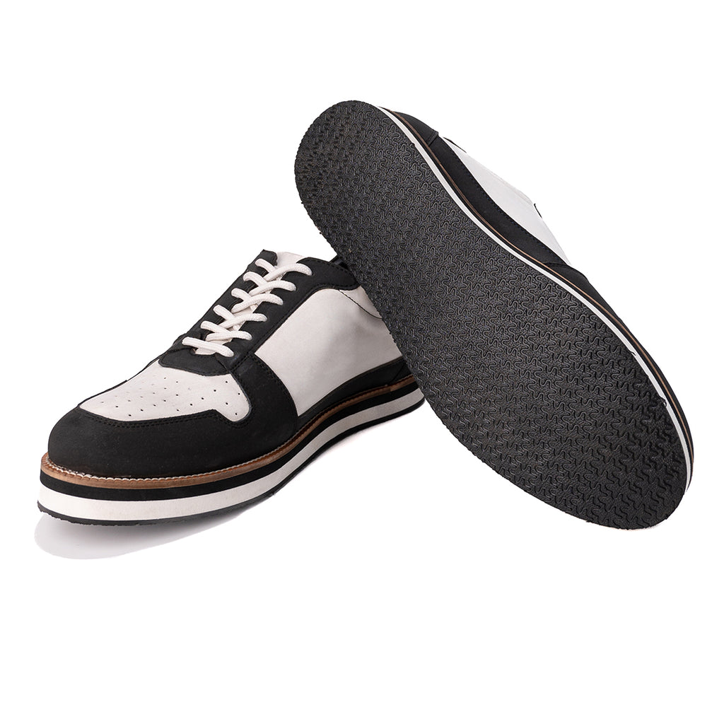 White and black sneaker with perforations