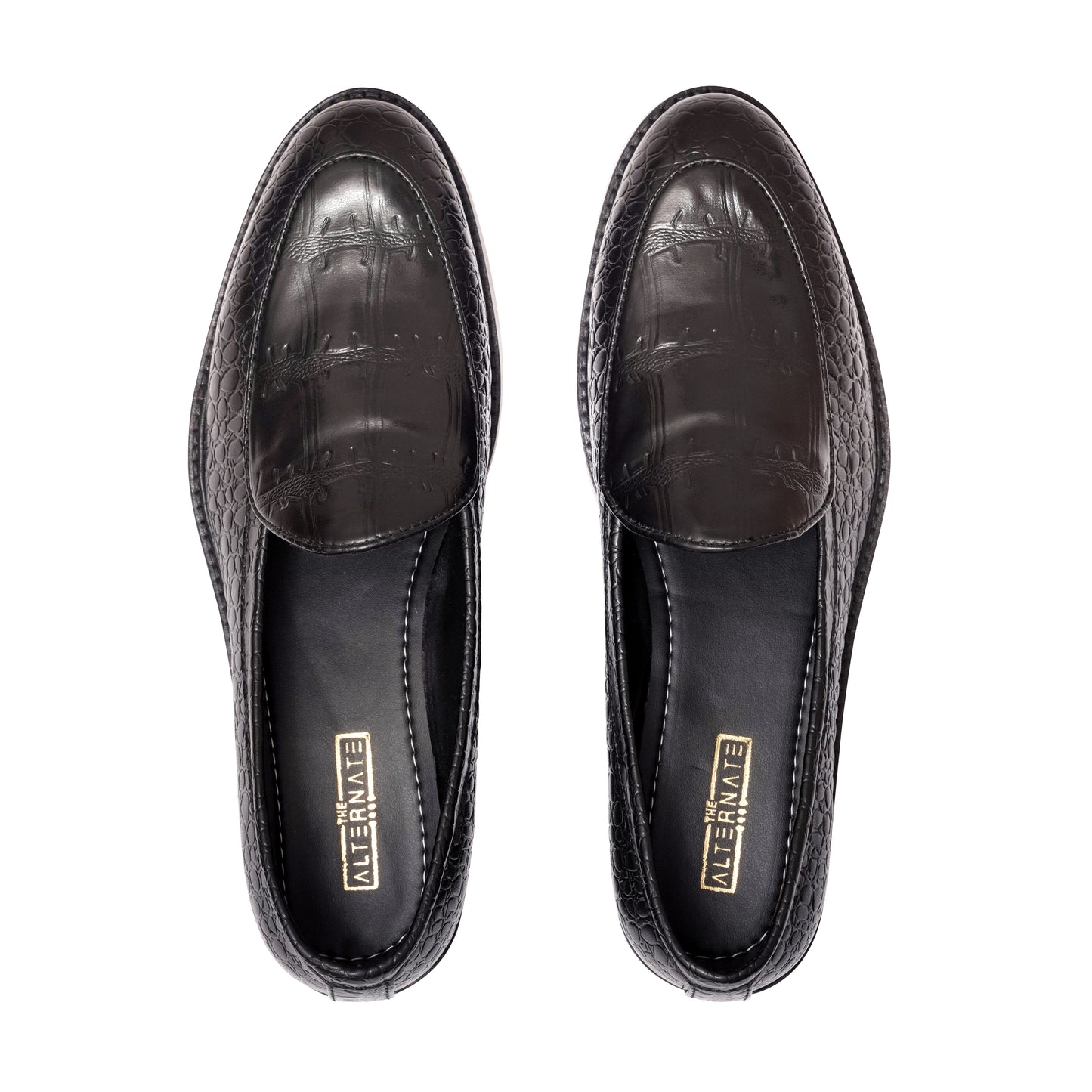 EMBOSSED SLIP-ONS- BLACK