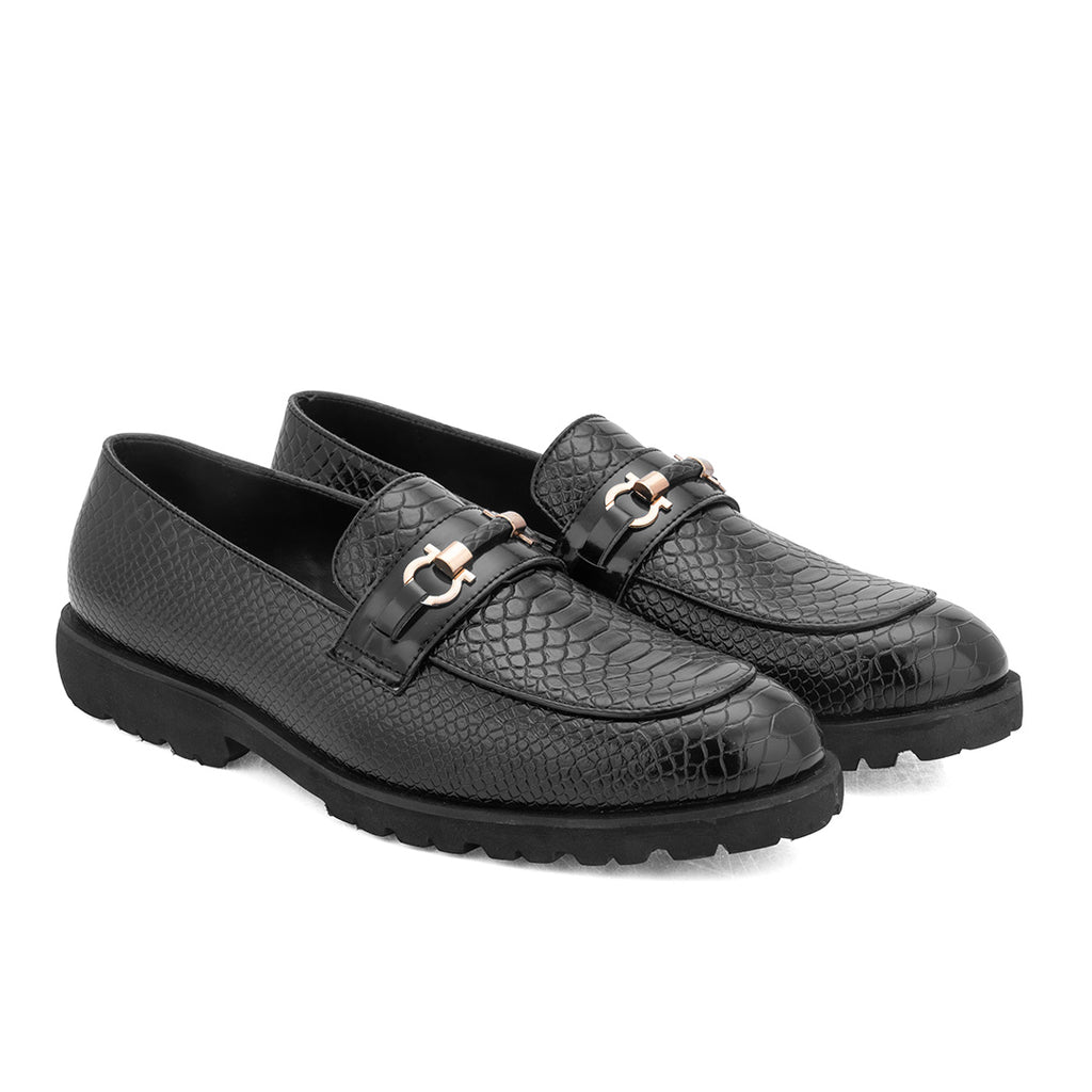 Black slip-ons with textured detail