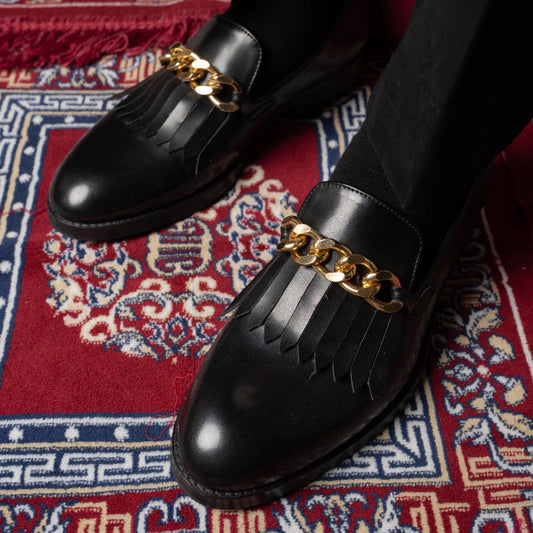 FRINGE LOAFERS WITH CHAIN DETAIL-BLACK
