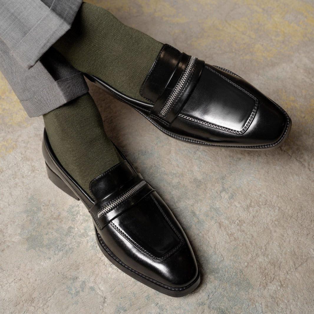 BLACK SLIP-ONS WITH ZIP DETAIL