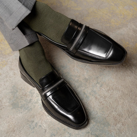 BLACK SLIP-ONS WITH ZIP DETAIL